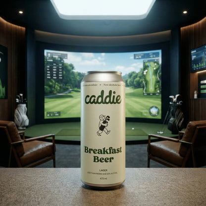 Caddie Breakfast Beer can on a table with a golf simulator in the background